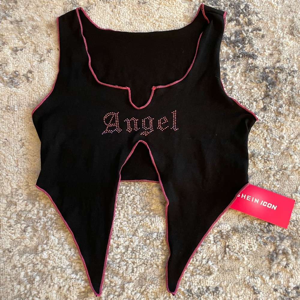 XS but fits more like a S